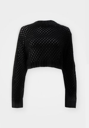 Svart kort kardigan med ett stickat mönster som har öppna diamantskärningar. Ribbat halsringning och ärmslut, texturerad tyg. Långa ärmar.