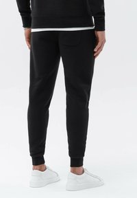 Ombre Trainingsbroek - black