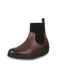 Botte de cheville en cuir marron avec section de cheville élastique noire, bout rond, semelle texturée noire et tirette à l'arrière pour un enfilage facile.