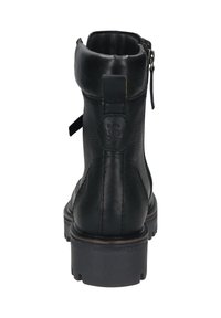 Stivale alla caviglia in pelle nera con punta rotonda e finitura testurizzata. Presenta una chiusura con zip sul lato e una suola spessa con motivi circolari.