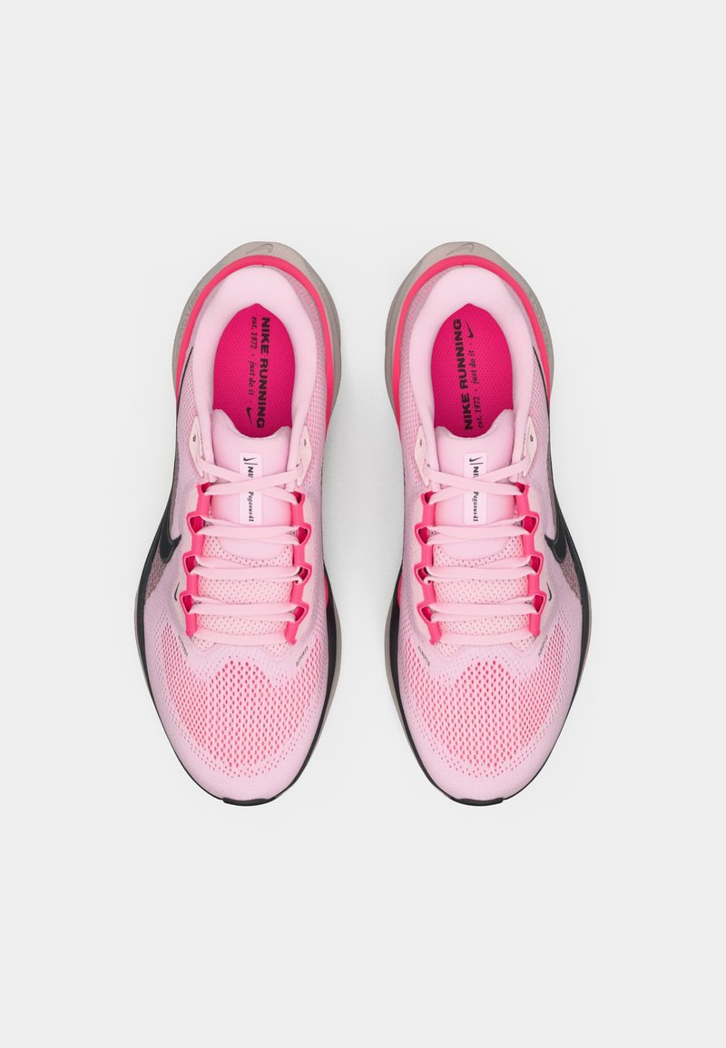 Pink breathable mesh running shoes with black accents, featuring a padded collar, flat laces, and a textured sole for grip.