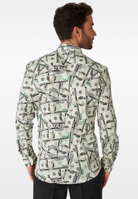 Long-sleeve shirt in a light fabric featuring a green and black dollar bill print, with a button-down collar and curved hem design.