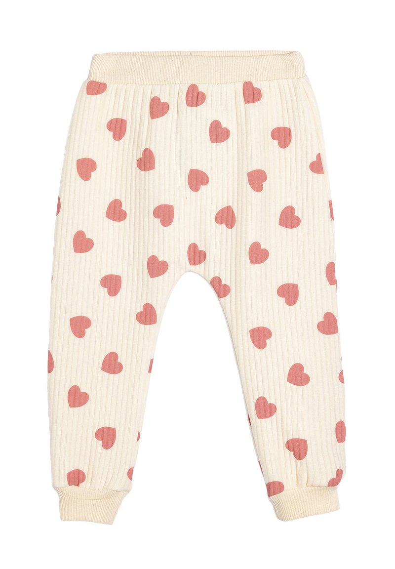 Cremefarbene Ripp-Hosen mit rosa Herzmustern. Verfügt über einen elastischen Bund und ein Bund mit Cuffs. Weiche Textur, die sich gut für die Freizeitkleidung eignet.