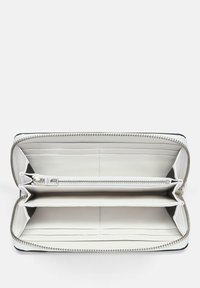 Black and white zip-around wallet with a leather finish, featuring multiple card slots, two compartments, and a zippered pocket.