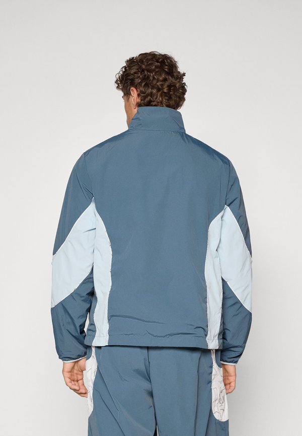 KIDSUPER MANCHESTER CITY FC REVERSIBLE JACKET - Club wear3