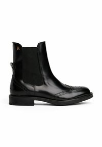 Botte Chelsea en cuir noir avec panneaux latéraux en élasthanne, détails de brogue, bout arrondi et talon bas empilé. Logo discret sur le talon.