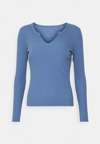 Maglietta a maniche lunghe a costine di colore blu medio, con un scollo rotondo a V e una forma aderente per una vestibilità snug.