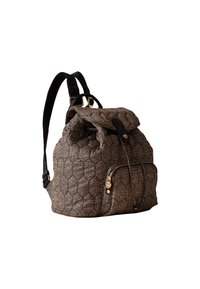 Brown patterned backpack with a black leather flap and adjustable straps. Features a front zipper pocket and gold-tone hardware accents.