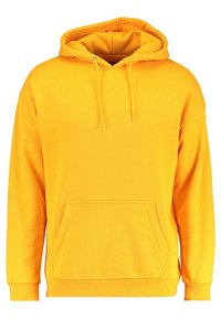 Felpa gialla realizzata in tessuto morbido, con cappuccio regolabile con cordino, tasca frontale e polsini e orlo a coste.