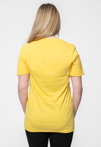 Paradiso Clothing Print T-shirt - yellow