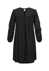 Robe noire jusqu'aux genoux avec de longues manches bouffantes, un dos en trou de serrure et une texture froncée le long des épaules. Tissu lisse et léger.