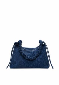 Navy blue handbag made of textured leather, featuring a gathered handle, floral embossing, and side drawstrings for closure.