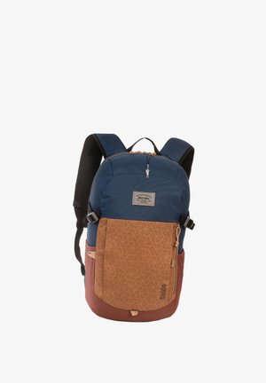 Blue and brown backpack with a textured bottom, adjustable straps, zippered compartments, and a logo patch on the front.
