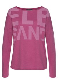 Langärmliges Oberteil mit Rundhalsausschnitt in leuchtendem Pink mit großen, hellpinken Buchstaben. Weicher Stoff, lockere Passform und leicht abgerundeter Saum.