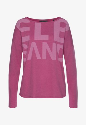 Langärmliges Oberteil mit Rundhalsausschnitt in leuchtendem Pink mit großen, hellpinken Buchstaben. Weicher Stoff, lockere Passform und leicht abgerundeter Saum.
