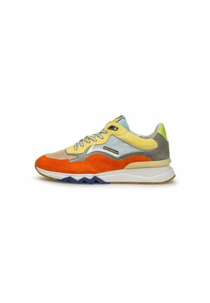 Multicolored sneaker featuring yellow, orange, and gray suede with mesh accents, a textured midsole, and zigzag tread pattern on the sole.