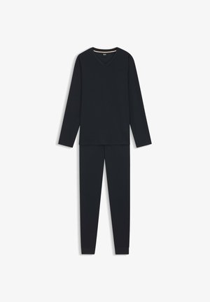 Musta thermopitkähihainen paita v-kaula-aukkolla ja siihen sopivat kapenevat housut, valmistettu teksturoidusta kankaasta, näyttäen yhtenäisen värin ja istuvuuden.