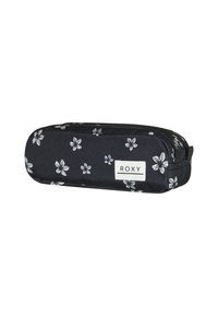 Trousse noire avec motif floral blanc, extérieur en tissu, fermeture à zip, et étiquette Roxy sur le côté. Forme cylindrique allongée.