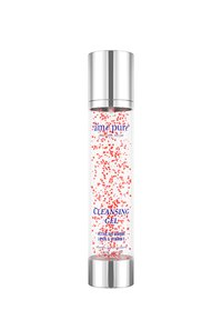Klar cylinderformet flaske med en sølvhætte. Gelen indeholder røde partikler og er mærket "Cleansing Gel" i blå tekst, med ingrediensdetaljer nedenfor.
