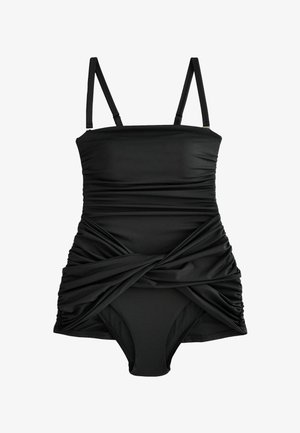 Fekete egyrészes fürdőruha vékony vállpántokkal és ráncolt anyagrészletekkel, szoknyás fedőrésszel, elöl csavart kialakítással.