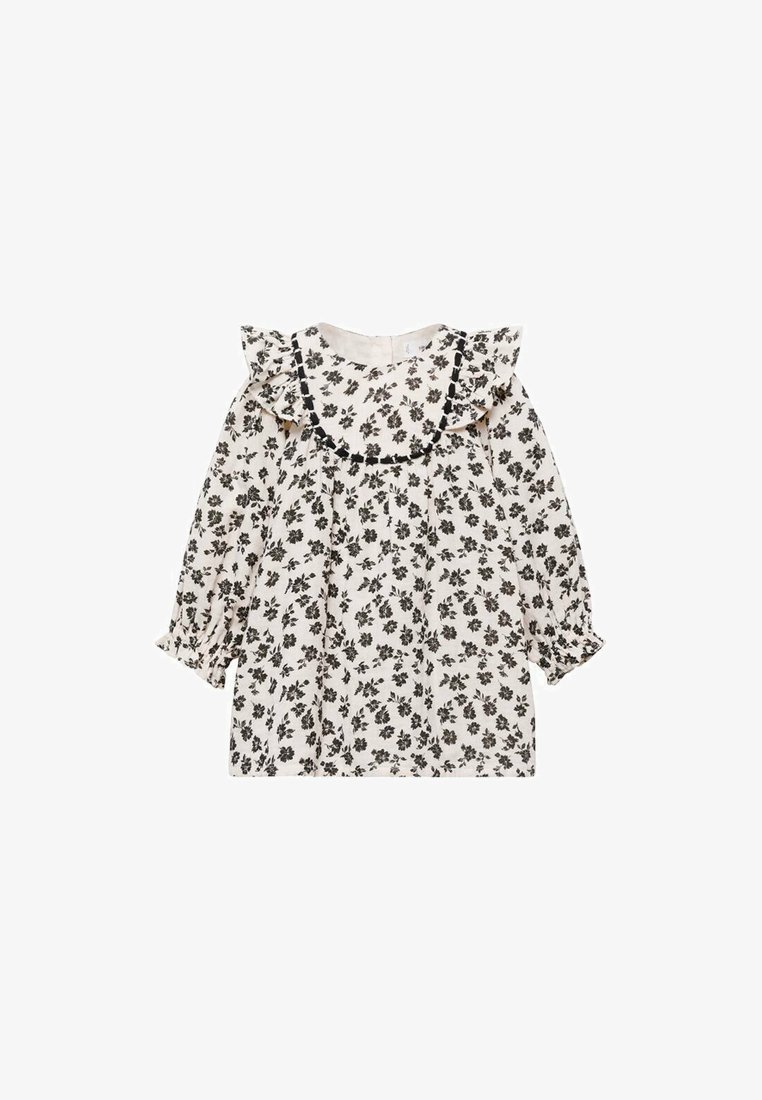 Bluză albă cu model floral negru, decolteu fronsat și mâneci lungi strânse la manșete. Material ușor, respirabil.