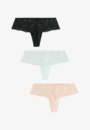 Három csipkével díszített női tangában, fekete, fehér és bézs színben, függőlegesen elrendezve fehér háttéren.