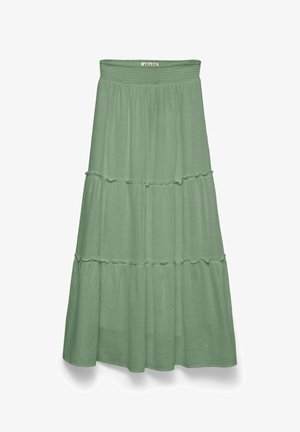 Jupe à volants vert clair avec ceinture élastique et détails subtils de volants, étiquetée "AWARE" en haut au centre.