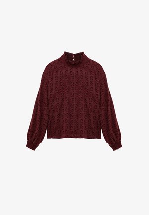 Bordeaux pullover met een geribbelde textuur, hoge volantschol, en opgezette mouwen. Heeft een bladdessin en een cropped silhouet.