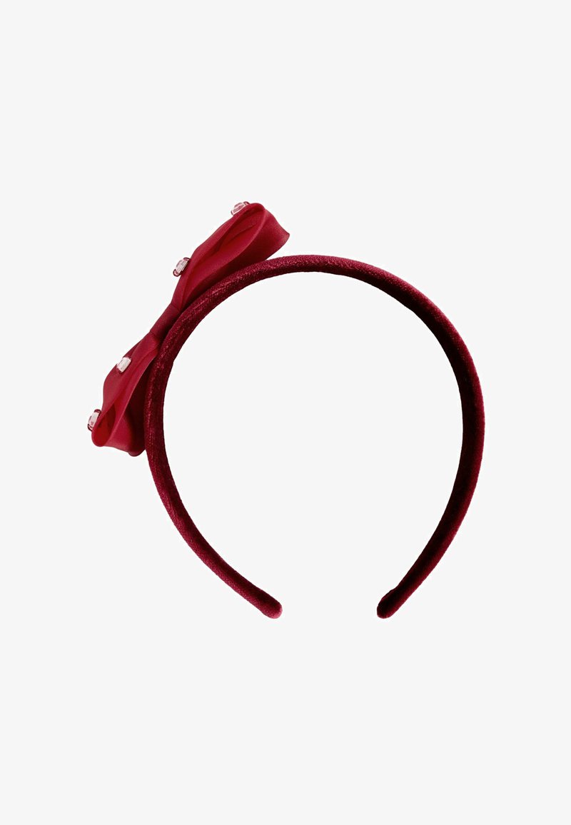 Cerchietto in velluto rosso con un fiocco in satin abbinato decorato con piccole perline trasparenti su un lato.
