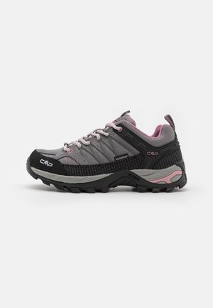 Waterproof hiking shoes with a gray upper, black accents, gray and pink details, and a rugged black sole for traction.