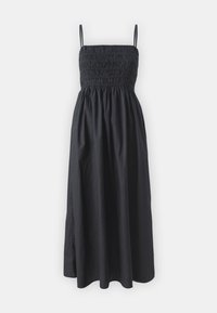 Robe maxi noire avec bretelles fines, corsage froncé, jupe fluide et tissu léger. Texture lisse avec une silhouette générale décontractée.