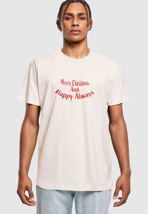 Lyserød bomulds T-shirt med korte ærmer, der har en rød grafisk tekst, som siger "Glædelig Jul og Godt Nytår", rund halsudskæring, afslappet pasform.