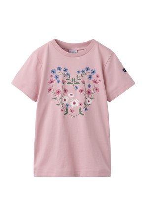 Pink cotton t-shirt featuring a floral design in blue and pink hues, with small, white daisies and green stems, short sleeves, and a crew neck.