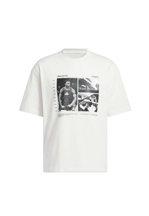 Vit bomull t-shirt med korta ärmar, med grafiska tryck i svart. Designen inkluderar text: "[TRO]" och "[ATT]" tillsammans med bilder.