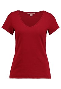 Red cotton T-shirt with short sleeves and a deep V-neck. Features a smooth texture and simple, unembellished design.