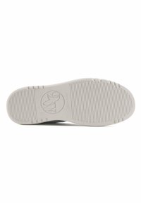 Semelle de chaussure en caoutchouc blanc présentant une surface texturée, un motif cannelé et un logo circulaire au centre avec le nom de la marque "NINE WEST".