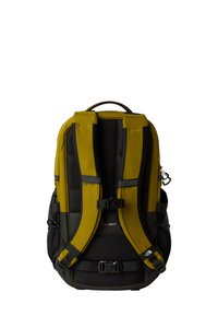 Backpack features a yellow and black design, made from durable material with padded straps and a top handle. Notable hardware includes side buckles.