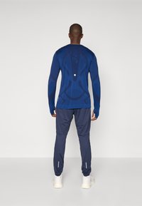 ASICS LITE-SHOW PANT - Outdoor trousers - midnight