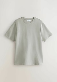 Lysgrøn bomulds T-shirt med korte ærmer, rund halsudskæring og en glat tekstur. Simpelt design uden mønstre eller synlige detaljer.