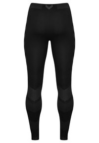 Legging noirs en matériau extensible avec une taille haute, présentant un motif en chevron et des accents texturés sur les côtés.