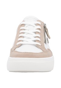 White sneaker with beige suede accents, featuring a zip closure on the side, white laces, and a textured white rubber sole.