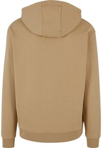 Beige hettegenser med en glatt tekstur, kengurulomme, ribbede mansjetter og nederkant, med en enkel bakdesign uten dekorasjoner.