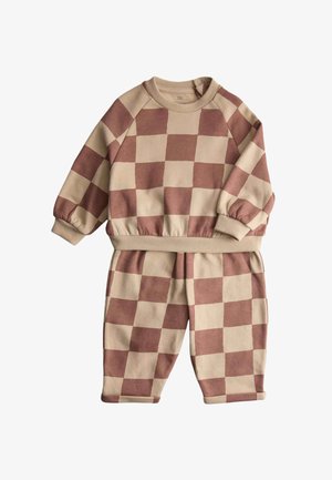 Ensemble sweat-shirt et pantalon à carreaux marron et beige, fabriqué en tissu doux. Comprend des poignets et une ceinture côtelés pour un ajustement confortable.