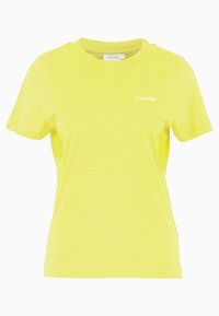 Žluté bavlněné tričko, krátké rukávy, kulatý výstřih, s malým bílým logem Calvin Klein na levé přední straně.