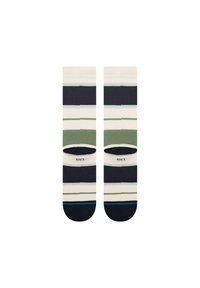 Sosete de echipă cu dungi în nuanțe de bleumarin, verde și crem. Prezintă dungi orizontale de lățimi variate. Fabricate dintr-un material moale și elastic.