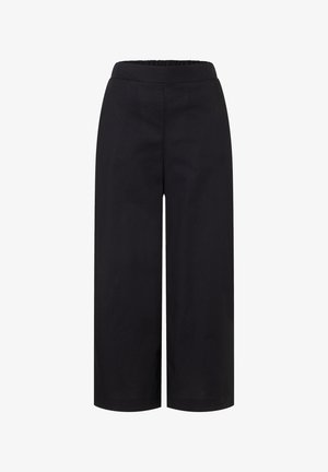 Schwarze, weit geschnittene Hose mit elastischem Bund, mittlerer Leibhöhe, knöchellang, glattem Stoff und ohne sichtbare Taschen oder Verzierungen.