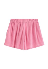 Rosa shorts gjorda av texturerad tyg, med elastisk midja och sidfickor. Designen är lös passform med släta kanter.