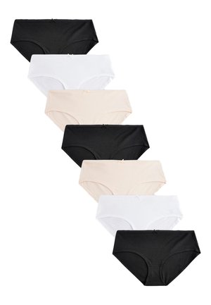 Sedem dámskych bavlnených nohavičiek v čiernej, bielej a béžovej farbe, usporiadaných diagonálne na bielom pozadí.