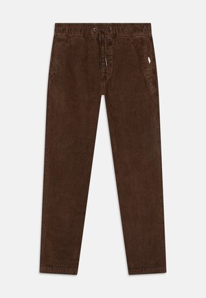 Brown corduroy pants with an elastic waistband, drawstring closure, and side pockets. The fabric features a ribbed texture.