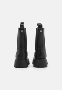 Steve Madden DISCLOSE - Kotníkové boty na platformě - black